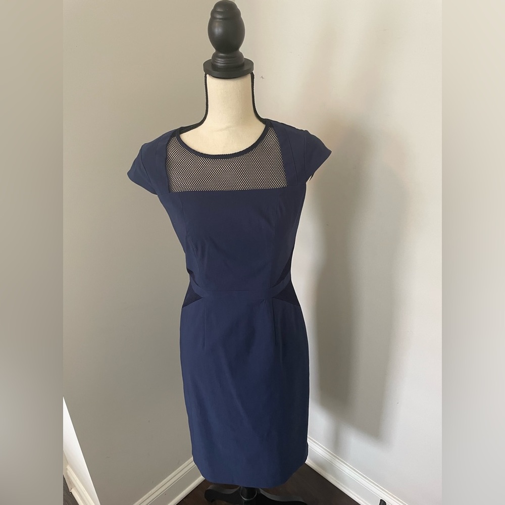 Great navy everyday dress with beautiful detail. Size 6. Worn less than 4 times.